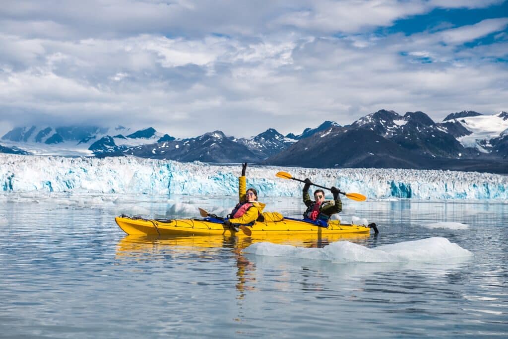 Happy couple enjoys ocean kayaking on Juneau excursions